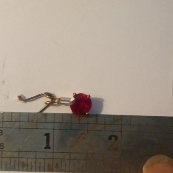Solid gold and ruby pendant